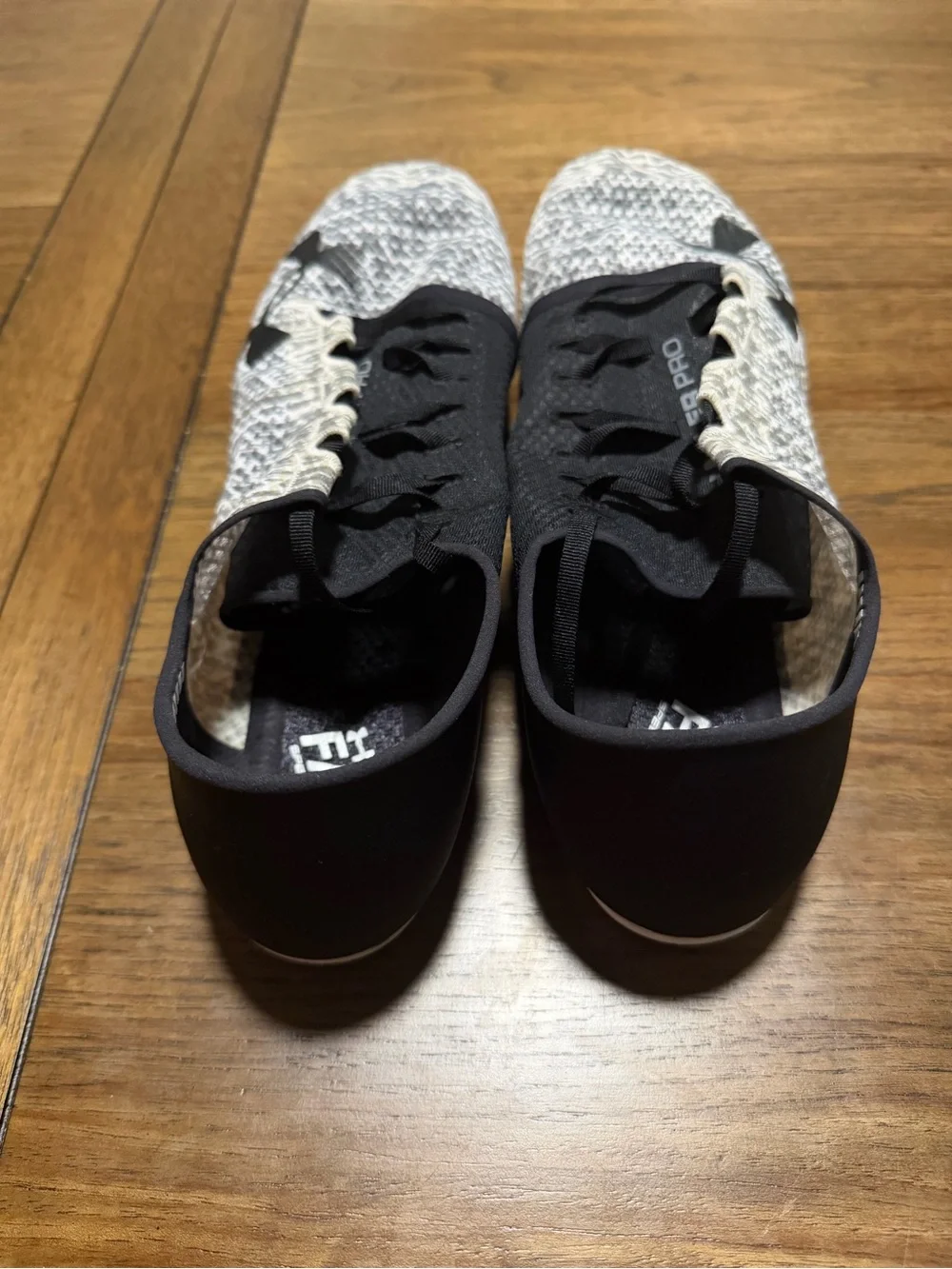 Under Armour Men’s Black and White Knit Athletic Shoes